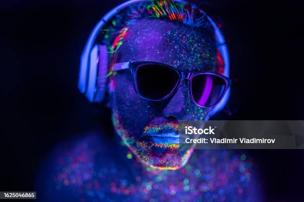 Portrait Of A Male Dj Under Uv Lights Stock Photo - Download Image Now - Music, Artificial Intelligence, Avatar