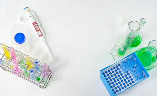 laboratory equipment and glassware on display leaving white isolated background for text