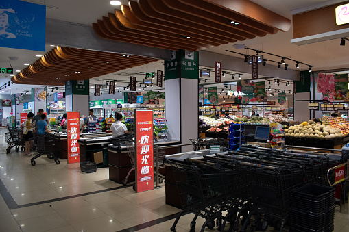 zhenhuae mart, yantai, shandong, china - august 19, 2023 : fresh vegetables supermarket at thearket place