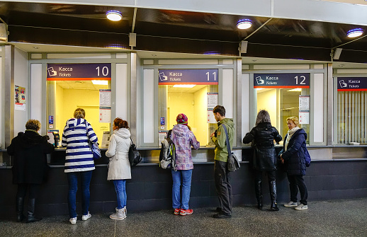 Saint Petersburg, Russia - Oct 5, 2016. People buy ticket at railway station in Saint Petersburg, Russia. The Russian railways are ranked second longest globally, behind the railways of US.