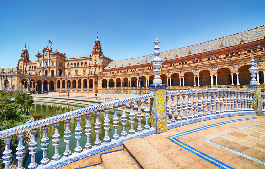 The Plaza de Espana, built in 1928, is a plaza in the Parque de Maria Luisa in Seville, Spain