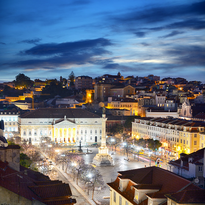Pedro IV Square or Rossio Square in the city of Lisbon, Portugal. Composite photo