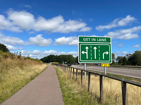 Get in lane sign on a main road