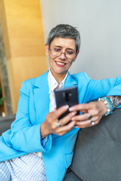 istock Mature woman using smat phone 1625197586