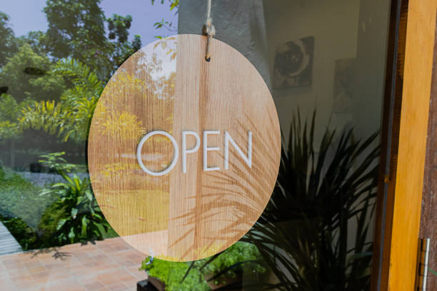 istock Text on a wooden sign “Open” in a coffee shop. 1625209062