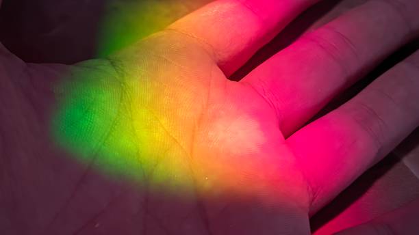 istock Closeup of a palm with rainbow light effect highlights 1625213362