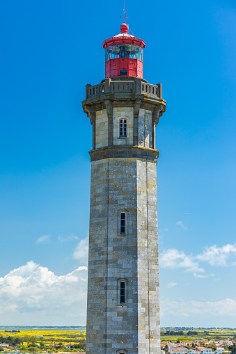 Front view of the Phare des Baleines lighthouse in Saint-Clément-des-Baleines, France