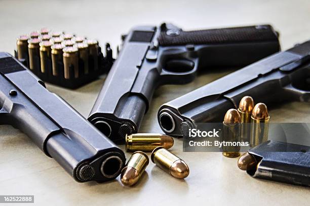 Three Pistols Stock Photo - Download Image Now - Gun, Handgun, Bullet