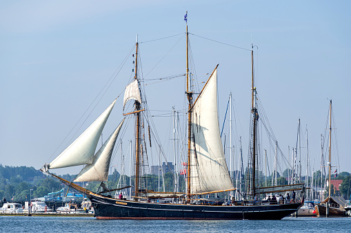 Eckernförde, Germany - June 19, 2021: three-masted topsail schooner Albatros in the Eckernförde Bay