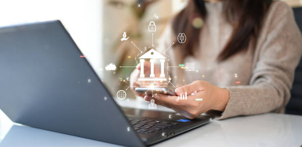 istock Woman using computer Laptop conducting online financial transactions through the internet. The concept of Mobile Banking or Virtual Banking technology that is convenient, emphasizing safety. 1625250655