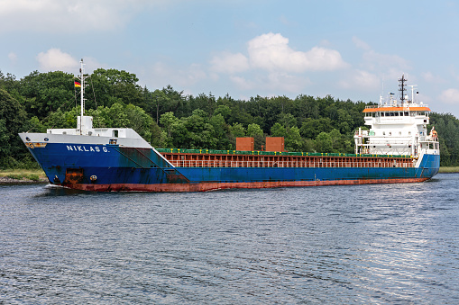 Sehestedt, Germany - June 19, 2021: general cargo vessel Niklas G in the Kiel Canal