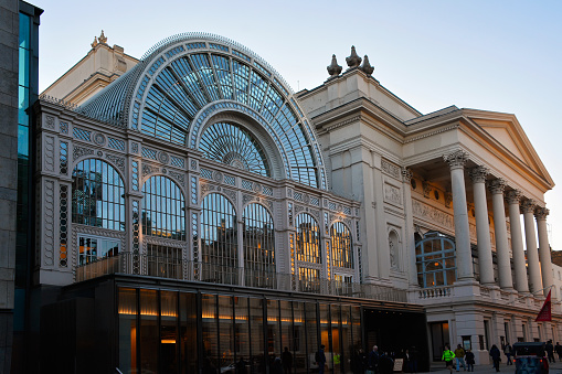 London, England - April 4, 2023: Facade of Royal Opera House at sunset.