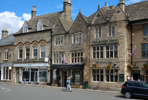 Stow on the Wold, Cotswolds, United Kingdom, August 15, 2023. Quaint charming traditional English village or town. High street and central market square. Summer day outdoors