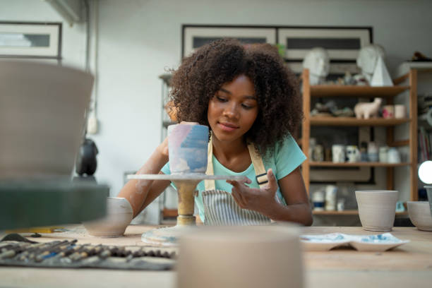 istock Art in Progress: American Woman Sculpting Pottery 1625308850
