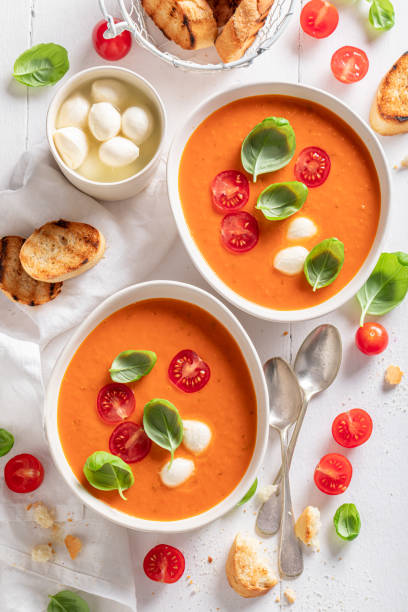 istock Creamy tomato soup made of basil and cherry tomatoes. 1625312702