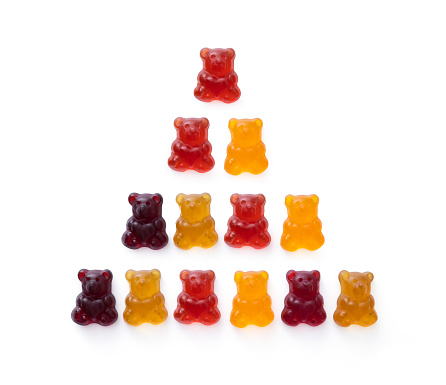 Colourful fruit flavoured gummy bears, piled up as a pyramid