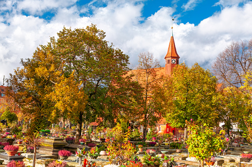 Autumn in graveyard . Johannisfriedhof Cemetery in Nuremberg Germany