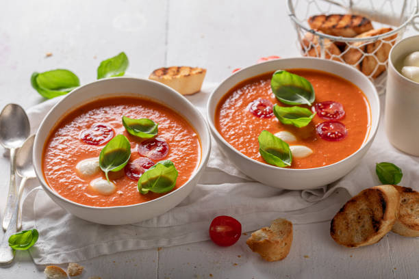 istock Red tomato soup with mozzarella cheese and crostini. 1625314489