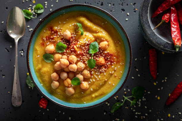 istock Green chickpea soup with hot chilli pepper and sesame seeds. 1625314504