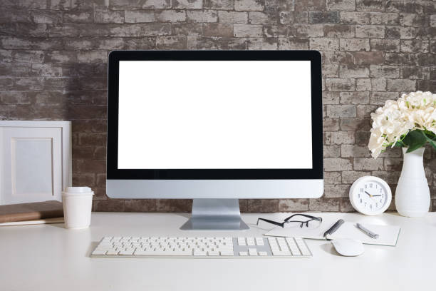 istock Front view of comfortable working space with computer, books and stationery on table. 1625319205
