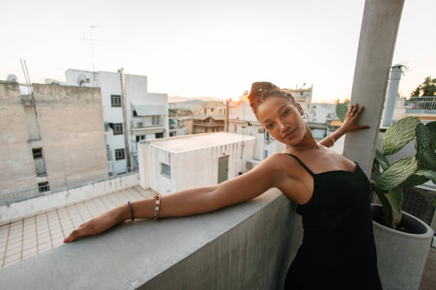 istock African woman posing on a rooftop 1625331537
