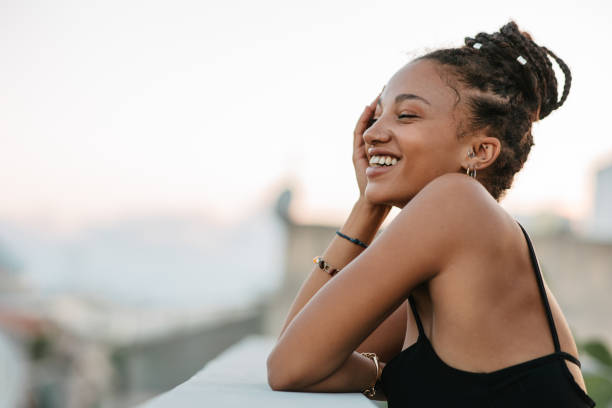 istock African woman posing on a rooftop 1625332062