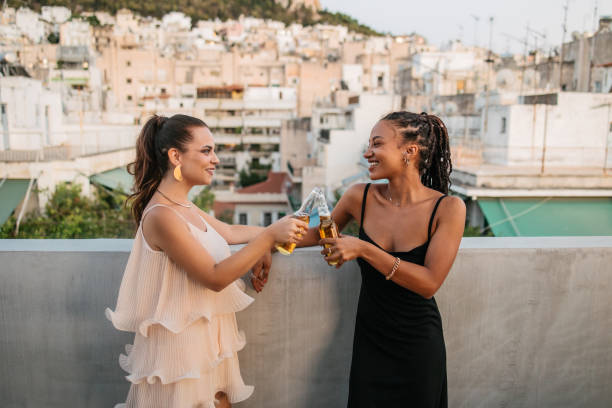 istock Female friends toasting with beer 1625333114