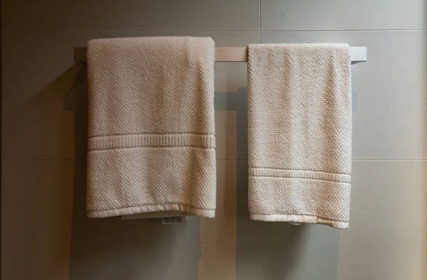 istock Closeup towel hanging on clothesline in the bathroom with space for texts 1625338818