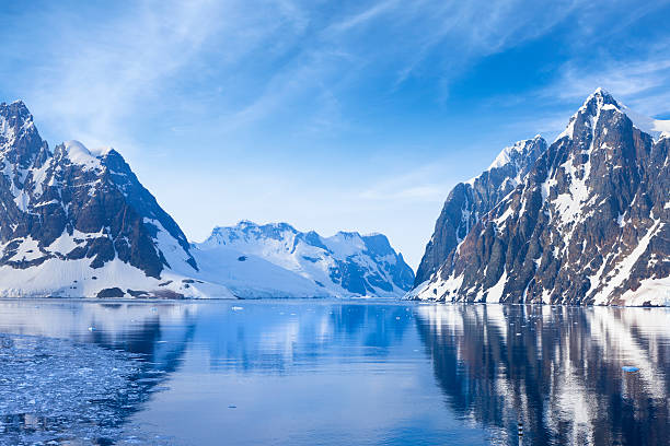 Antarctica Lemaire Channel snowy mountain http://farm9.staticflickr.com/8247/8468650322_798db833aa.jpg?v=0 antarctica travel stock pictures, royalty-free photos & images