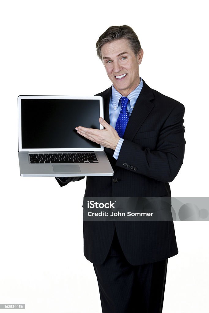 Mature man showing a laptop computer Mature man wearing a suit and holding a laptop computer while wearing a suit and tie  50-54 Years Stock Photo