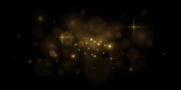 istock Gold sparks and golden stars glitter special light effect. 1625368616
