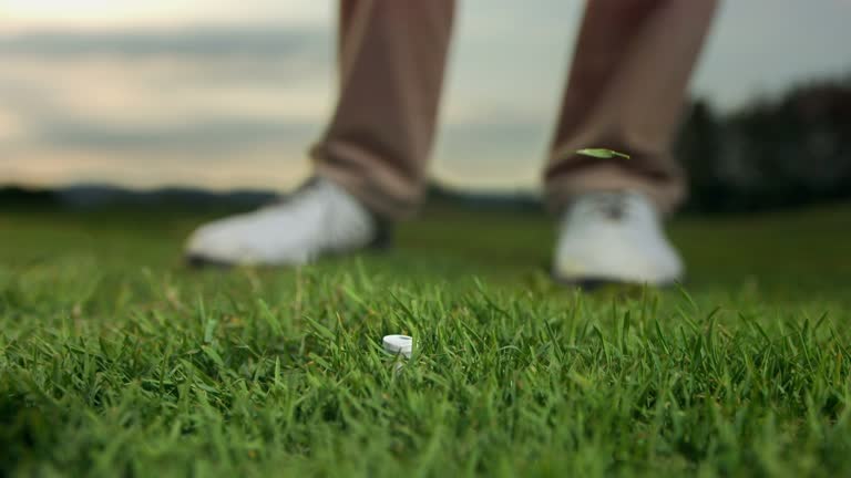 HD Super Slow-Mo: Close Up Of A Tee Shot