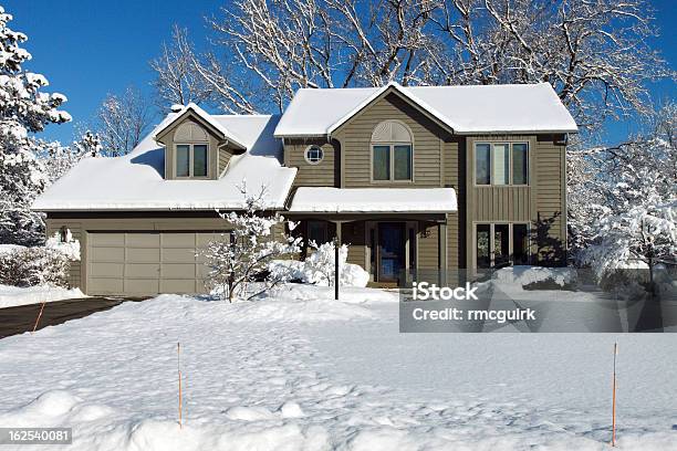 Suburban Colonial House In Winter Snow Stock Photo - Download Image Now - Snow, House, Winter