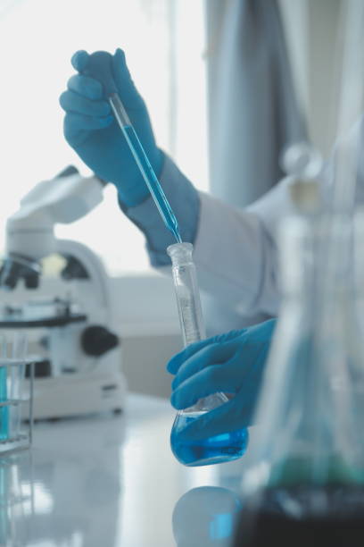 istock biochemical research scientist team working with microscope for coronavirus vaccine development in pharmaceutical research labolatory, selective focus 1625425840