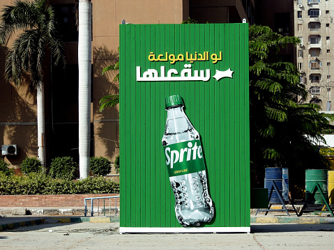 Cairo, Egypt, August 3 2023: Sprite lemon lime advertisement in the street, a lemon-lime beverage drink produced by the Coca-Cola Company, Sprite was developed in West Germany in 1959 as Fanta Klare, selective focus
