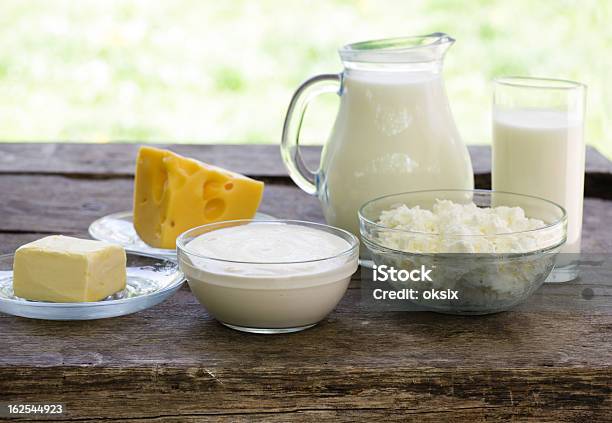Dairy Products On Wooden Table Stock Photo - Download Image Now - Breakfast, Cheese, Cream - Dairy Product