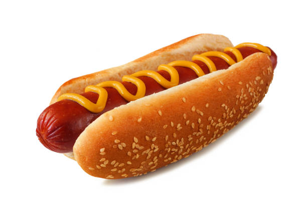 istock Hot dog with mustard in a sesame seed bun isolated on white 1625455284