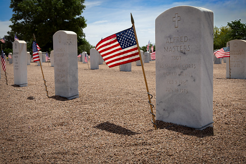 El Paso, Texas, USA - May 28, 2023: The grave of Alfred Masters, the first African American member of the Marine Corps, at Fort Bliss National Cemetery.