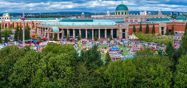 Aerial panoramic view of Trafford Centre shopping mall and the carpark + playground area.