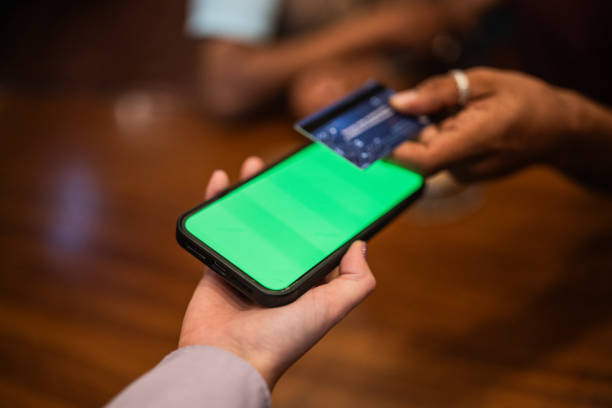 istock Close-up of customer paying using contactless payment in a restaurant 1625497499