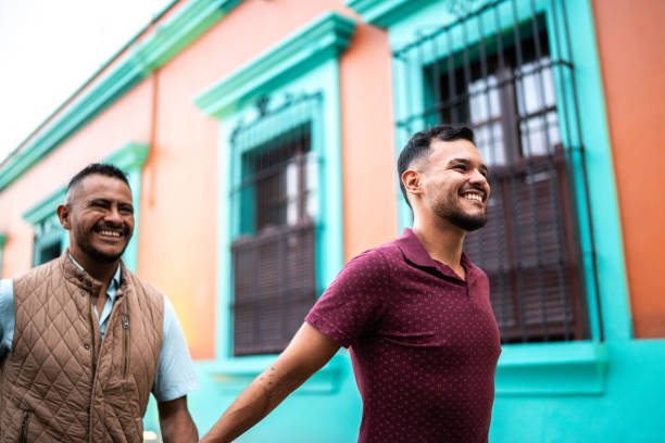 istock Gay couple walking at the historic district 1625517813