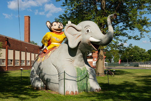 Malta, Illinois - United States - August 15th, 2023: Vintage Mighty Mouse and Dumbo statue at restaurant in Malta, Illinois, USA.