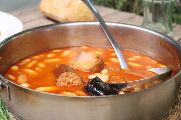 istock Fabada casserole. Typical Asturian dish made with beans, chorizo, black pudding and bacon 1625591281
