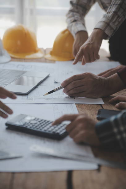 istock Engineer Teamwork Meeting, Drawing working on blueprint meeting for project working with partner on model building and engineering tools in working site, Construction and structure concept. 1625601066