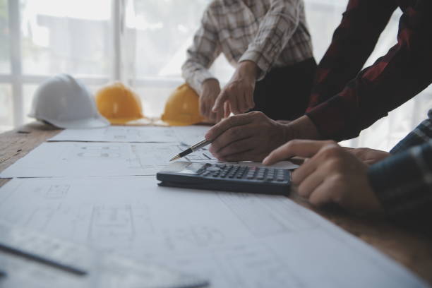 istock Engineer Teamwork Meeting, Drawing working on blueprint meeting for project working with partner on model building and engineering tools in working site, Construction and structure concept. 1625601078