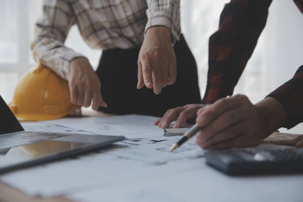 istock Engineer Teamwork Meeting, Drawing working on blueprint meeting for project working with partner on model building and engineering tools in working site, Construction and structure concept. 1625601081