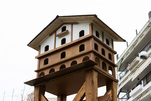 A birdhouse in the park.