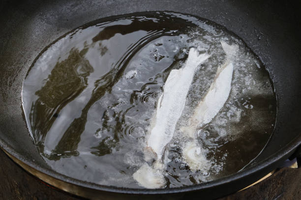istock Small crispy fish fried in oil with crispy breading. 1625615594