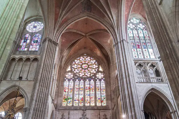 south transept and stained glass rose window of saint etienne gothic style cathedral in auxerre france