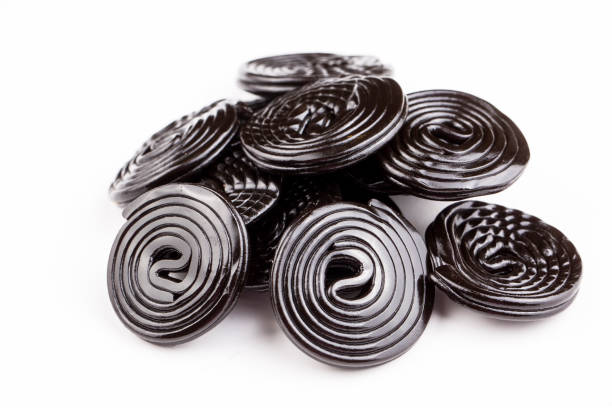 istock Licorice wheels, licorice candy on white background. 1625658847
